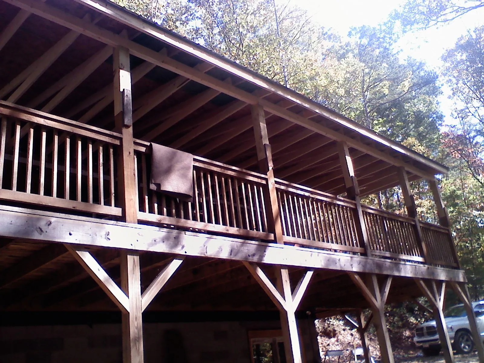 Timber framing under a new elevated porch and deck — Roof Leak Repair in Nora Springs by Roofing Brothers